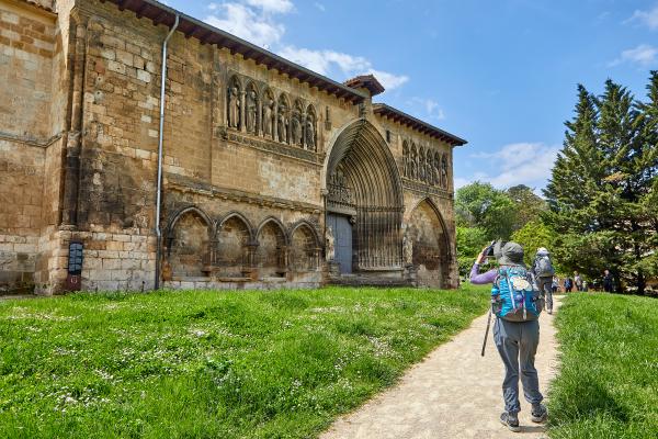 Pilgrim taking a picture of Santa María Jus del Castillo